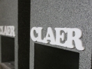expand Claer laser cut acrylic logo close up